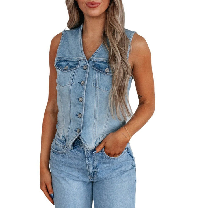 Women's denim vest with button placket and modern cut details. 0