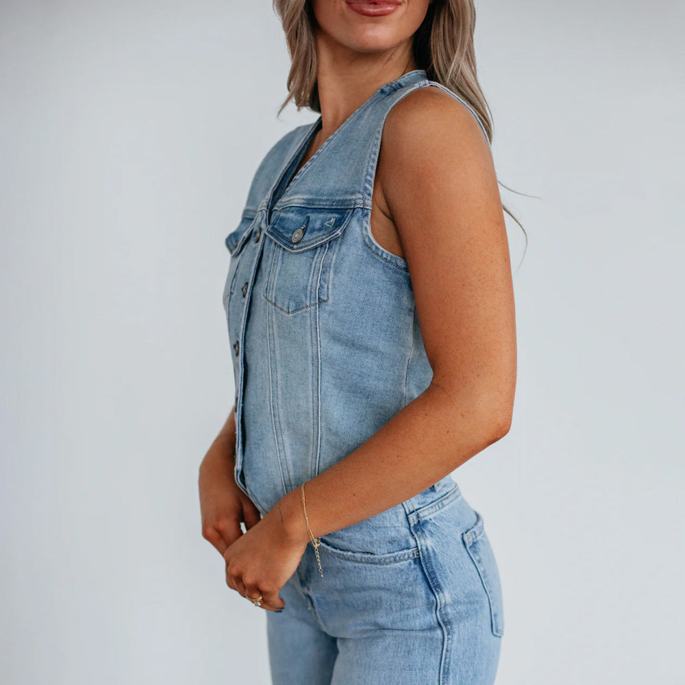Women's denim vest with button placket and modern cut details. 2